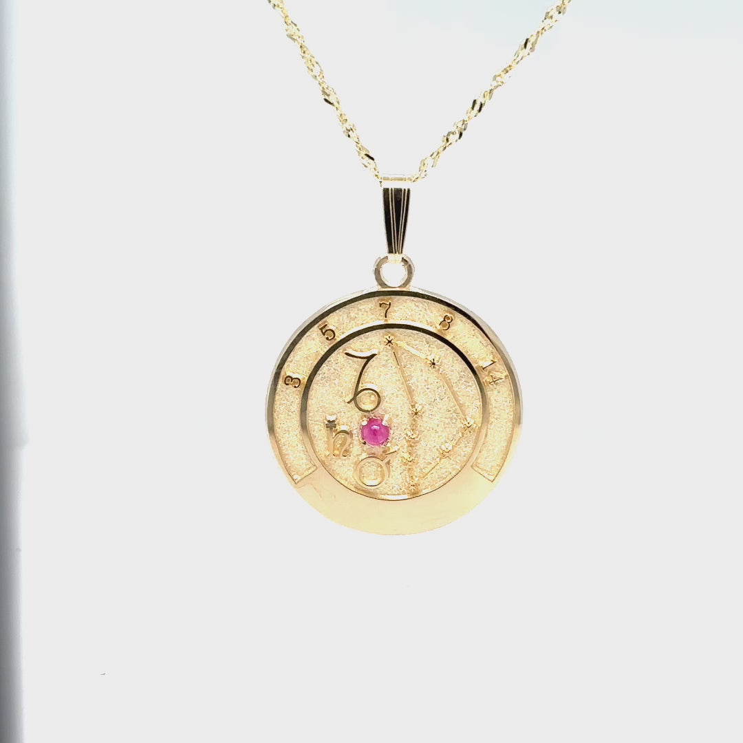 Capricorn zodiac gold pendant displayed as a meaningful spiritual talisman